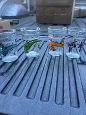 4 Vintage Welch's Jelly Jar Glasses Dinosaur 4” high clean picture