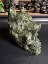 7848 CALL OUT CHIPPED EAR Jade Wolf On Skull 4.3”T 2.7”W 4.0”L Wt. 1 Lb. 11 Oz. picture