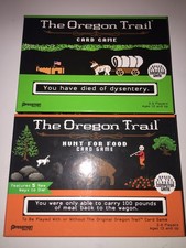2 The Oregon Trail games complete in original boxes based on the classic game picture
