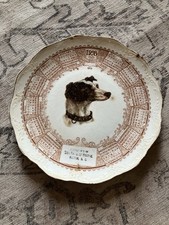ANTIQUE BANK OF BELTON SOUTH CAROLINA 1908 CALENDAR CERAMIC PLATE WITH DOG picture
