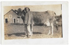 Farm Boy Milking Cow RPPC Real Photo Postcard Barn c1910s Rural picture
