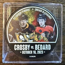 Sidney Crosby vs. Connor Bedard Souvenir Puck / Penguins vs. Blackhawks 10/10/23 picture