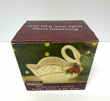 Classic Solutions Porcelain Ivory Swan Holly Bow Figurine Boxed picture