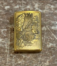 2002  Zippo  AMERICAN EAGLE AND MOUNTAINS BRASS. Un-fired  picture