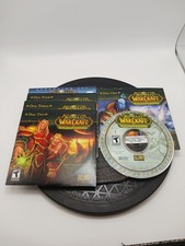 World of Warcraft Burning Crusade (4 Discs) + Wrath of the Lich King (1 Disc) picture