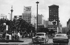 Cars travelling along a Los Angeles street Los Angeles 1963 Old Photo picture