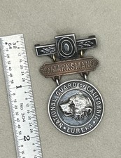 ANTIQUE 1896 SHREVE AND CO, CALIFORNIA MARKSMAN MEDAL IN STERLING AND COPPER picture