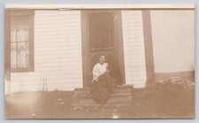 RPPC Unidentified Woman Sitting on Porch Real Photo Postcard picture