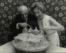 1969 Press Photo Joan Harland w Cake, Rainer Sauter, Swiss Cycling Team Manager picture