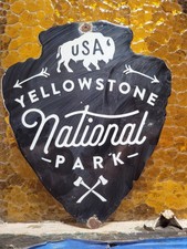 VINTAGE YELLOWSTONE PORCELAIN SIGN RARE OLD RARE NATIONAL PARK ARROWHEAD BUFFALO picture