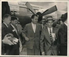 1957 Press Photo Richard Nixon at airport surrounded by cameramen. - mjx73225 picture