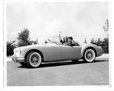 Vintage Classic Sports Car Road Trip Couple Antique  Ad Photo Press Photo picture
