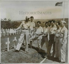 1947 Press Photo Capt E L Harrison Gives Instructions for Exhuming Bodies picture
