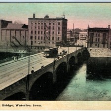 c1910s Waterloo, IA Fourth Street Bridge Postcard Trolley Cedar River Downtown picture