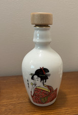 Vintage Porcelain Japanese Sake Bottle W/Illustration Of A Woman In A Kimono picture