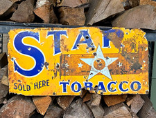 This is an absolutely unique, antique 1920s-1930s Star Tobacco advertising sign picture